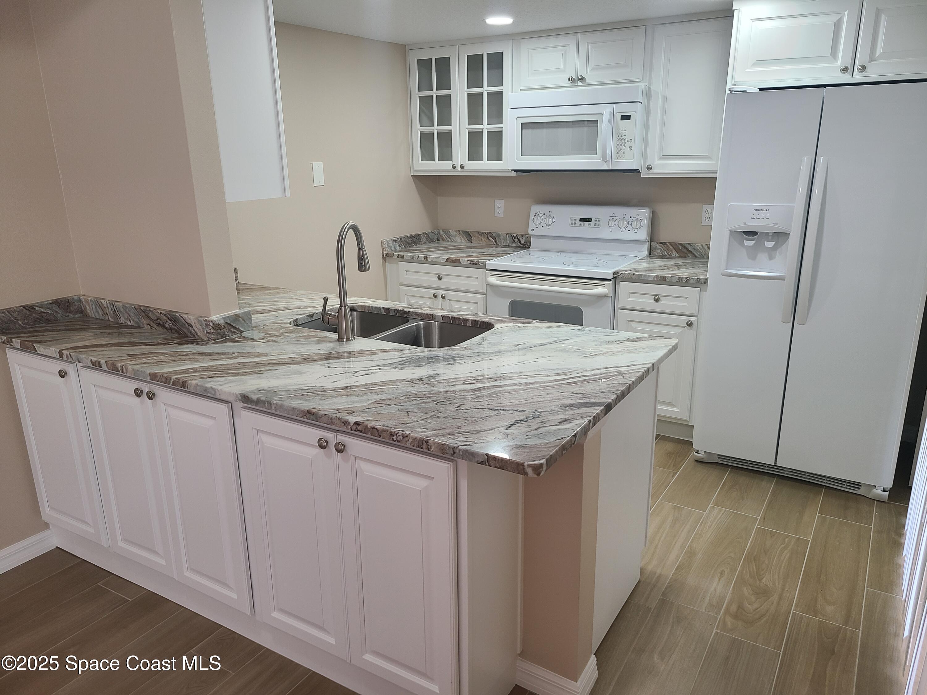 748 Ridge Club Drive, Unit 57 Melbourne, FL 32934 - Photo 2 of 22 20210523_163417