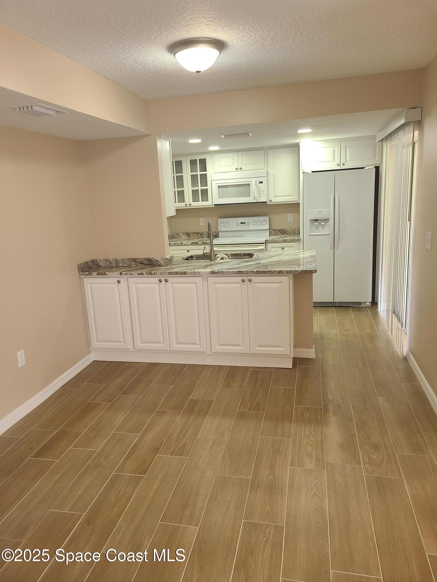 748 Ridge Club Drive, Unit 57 Melbourne, FL 32934 - Photo 7 of 22 20210523_163337