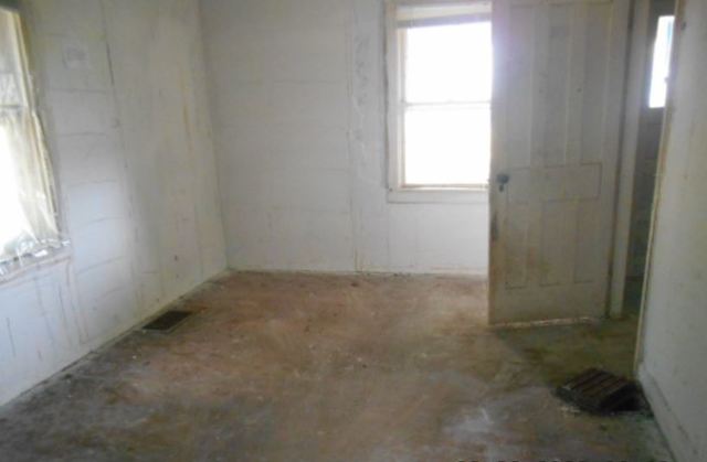 17294 Sumner Road Pecatonica, IL 61063 - Photo 4 of 10 an empty room with a window