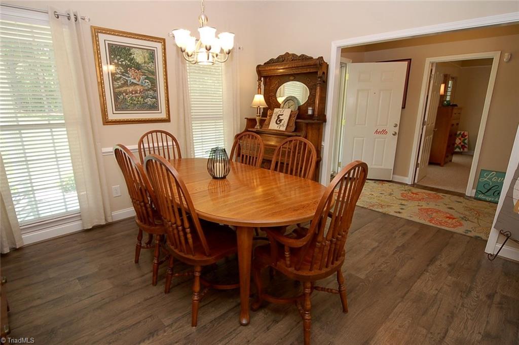 6205 Monnett Road Julian, NC 27283 - Photo 11 of 30 A view of the dining room and entry.