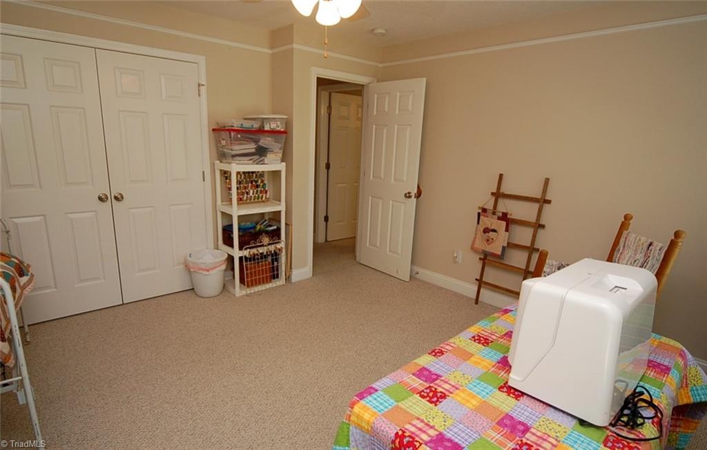 6205 Monnett Road Julian, NC 27283 - Photo 21 of 30 An additional room on the upper level currently being used as a sewing room.