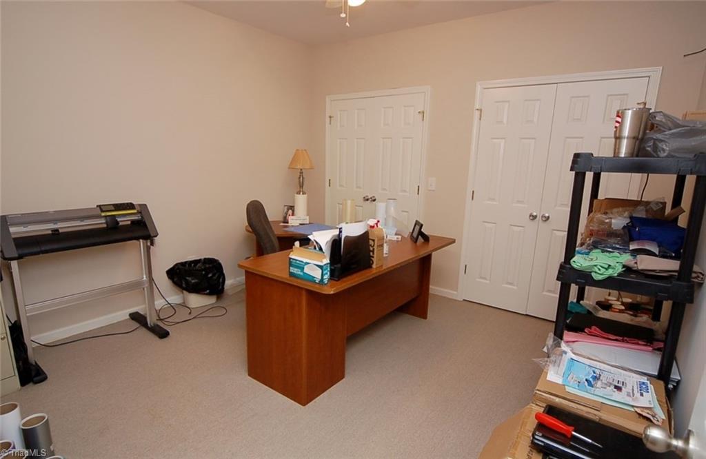 6205 Monnett Road Julian, NC 27283 - Photo 22 of 30 Work in privacy in the basement level office.