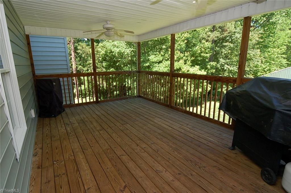 6205 Monnett Road Julian, NC 27283 - Photo 25 of 30 The spacious back deck is ideal for grilling, entertaining, or just relaxing.