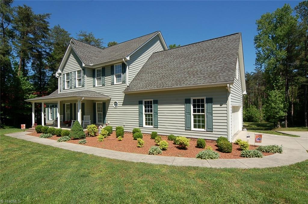6205 Monnett Road Julian, NC 27283 - Photo 30 of 30 Plenty of curb appeal and a pretty lot. Welcome home!