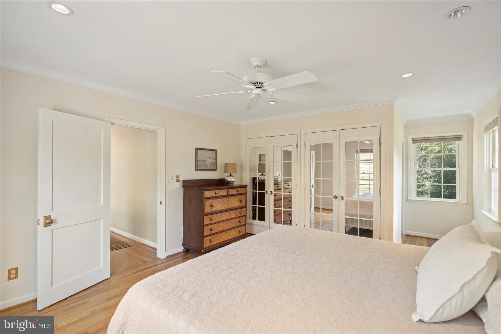 2413 Stanwick Road Phoenix, MD 21131 - Photo 16 of 46 a bedroom with a bed dresser and a large window