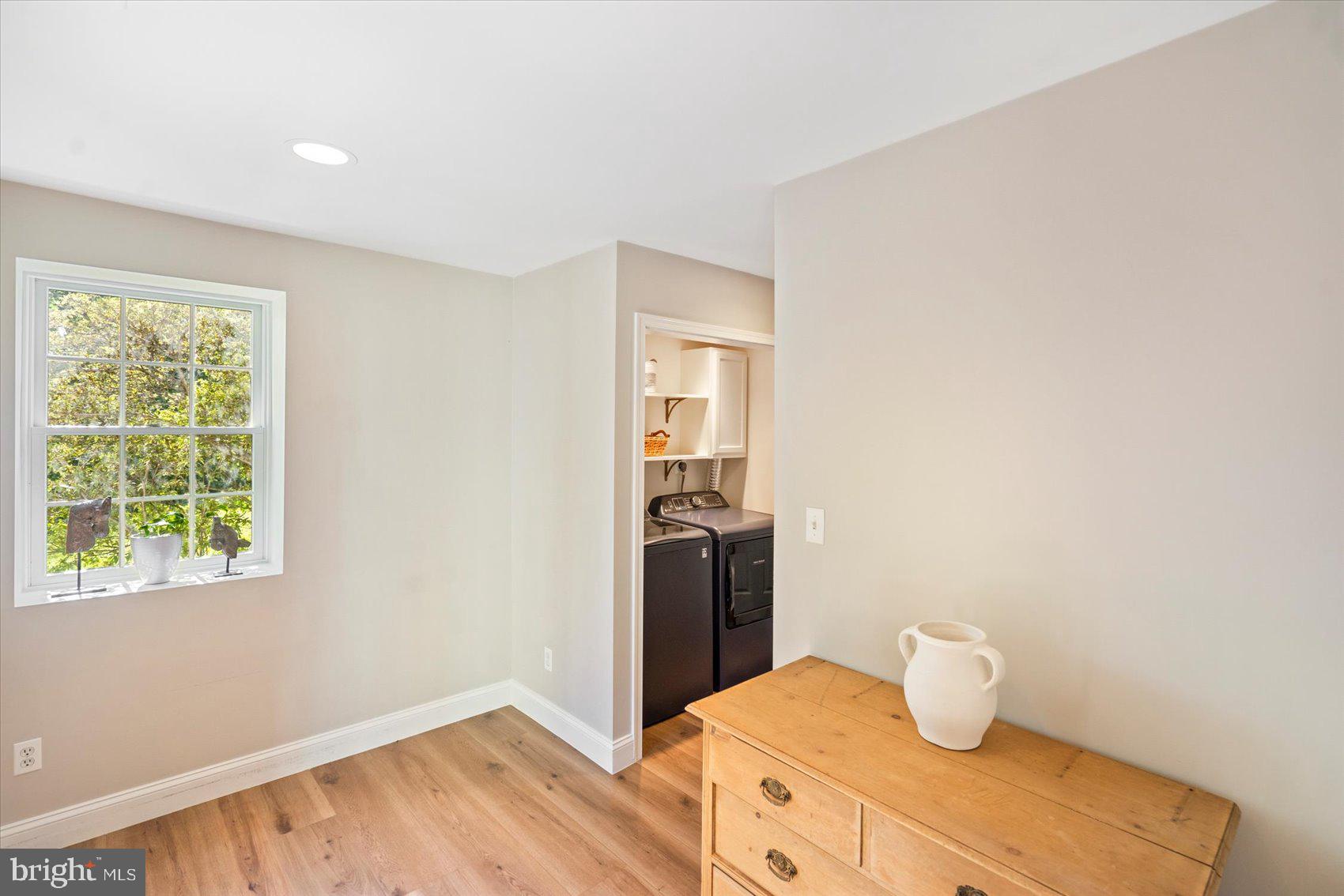 2413 Stanwick Road Phoenix, MD 21131 - Photo 28 of 46 a bathroom with a sink and a window