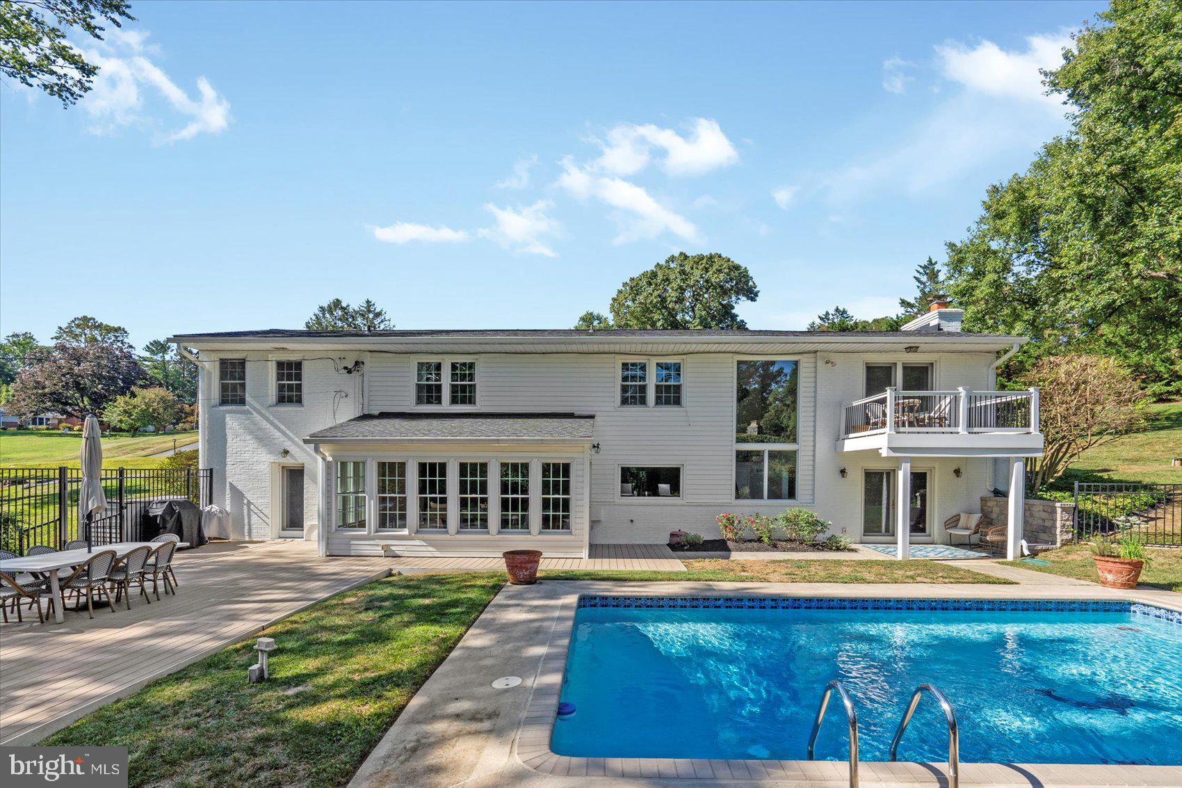 2413 Stanwick Road Phoenix, MD 21131 - Photo 34 of 46 a front view of house with yard swimming pool and outdoor seating
