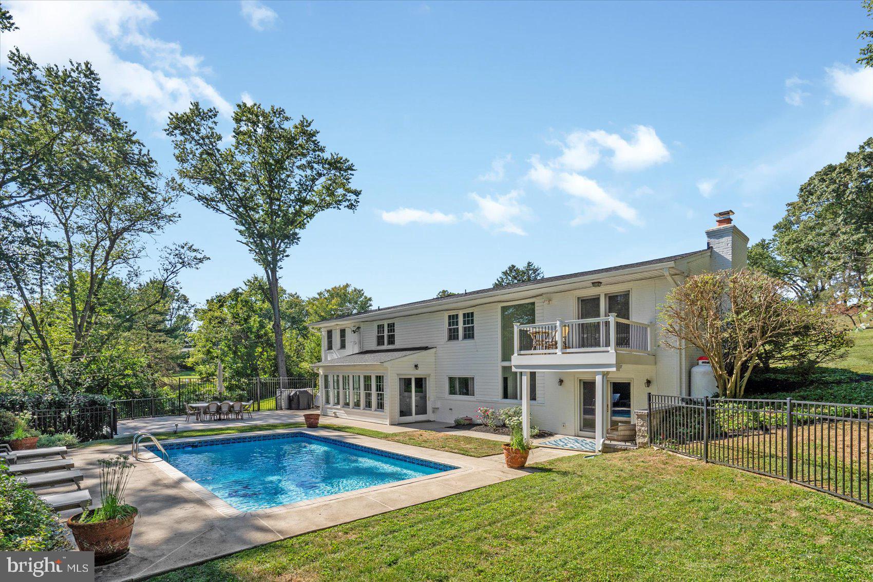 2413 Stanwick Road Phoenix, MD 21131 - Photo 40 of 46 a view of a house with pool and chairs
