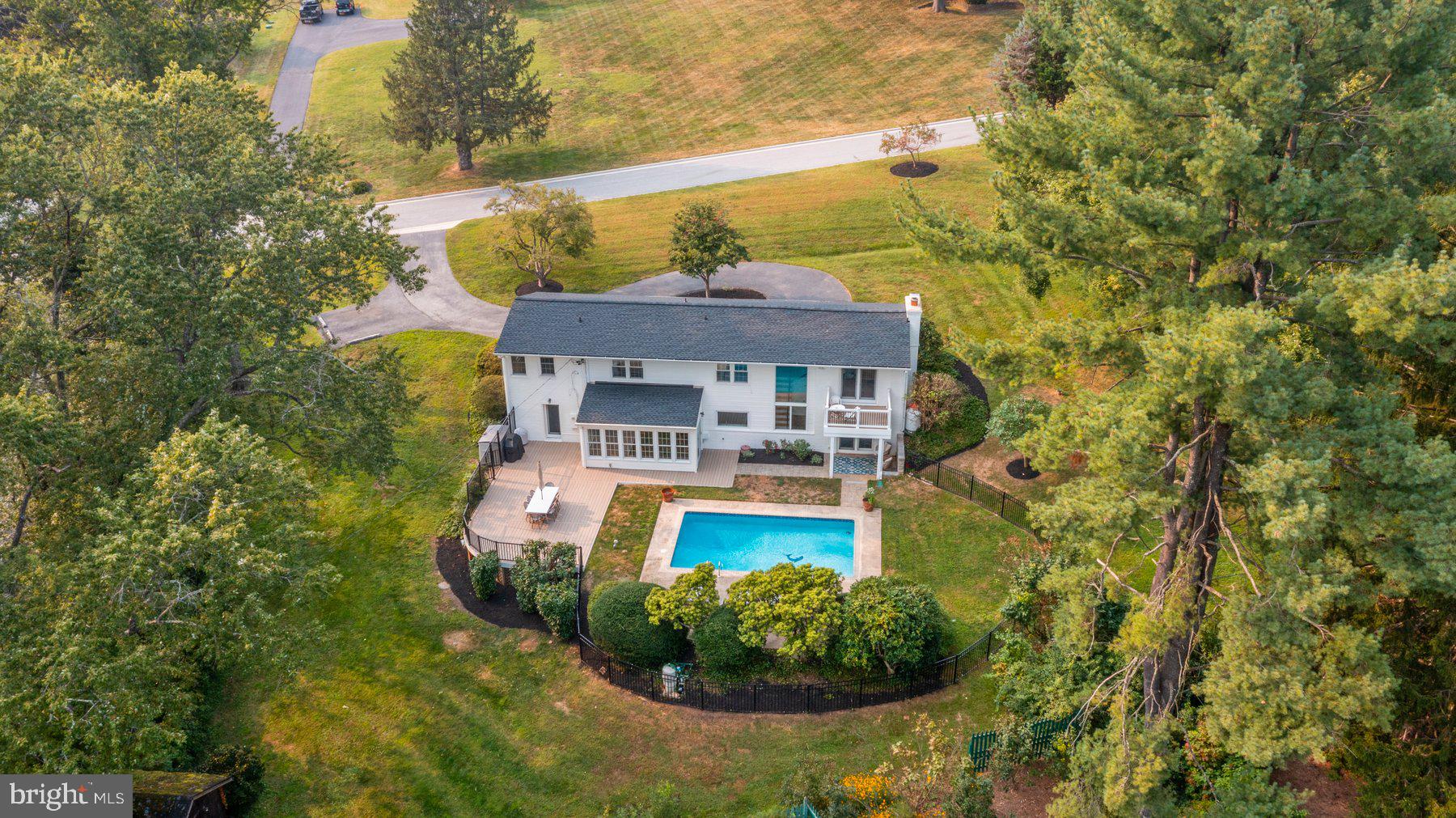 2413 Stanwick Road Phoenix, MD 21131 - Photo 5 of 46 a view of a swimming pool with chairs