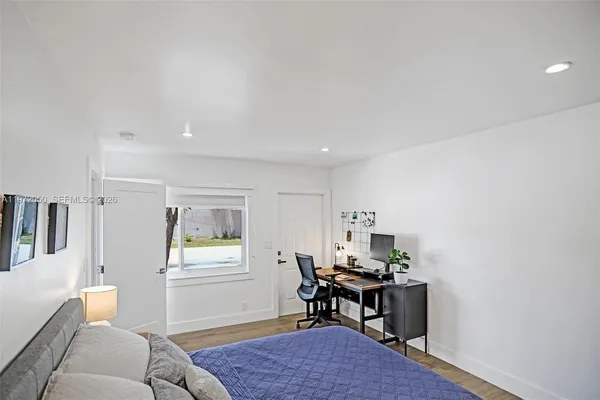 a workspace with furniture and window