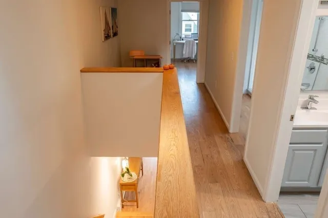 a bedroom with bed and window