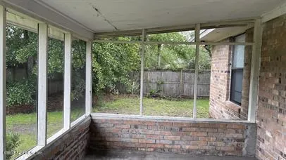a view of a room with porch and outdoor space