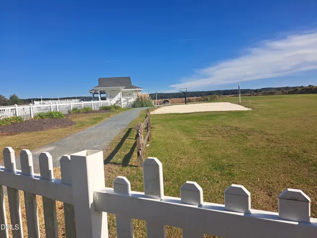 a view of a balcony with ocean view
