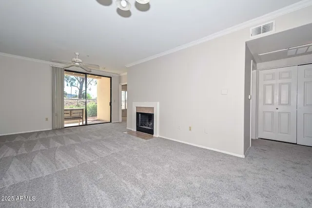 a kitchen with stainless steel appliances granite countertop a refrigerator sink and stove