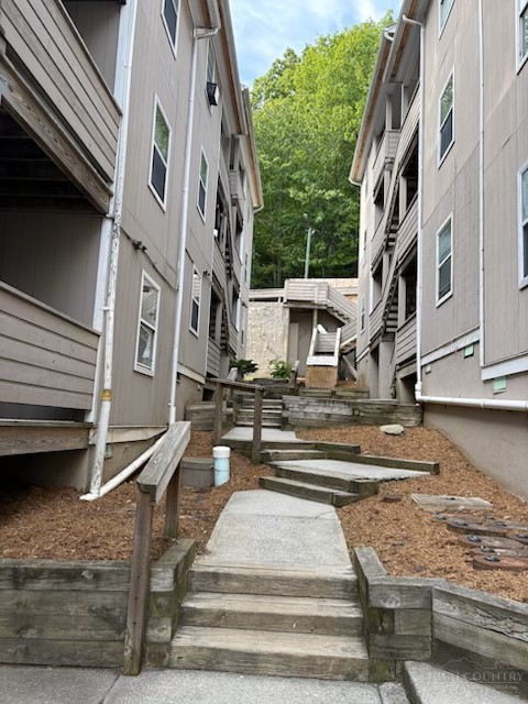 229 East King Street, Unit 31 Boone, NC 28607 - Photo 3 of 26 a view of a building with many windows