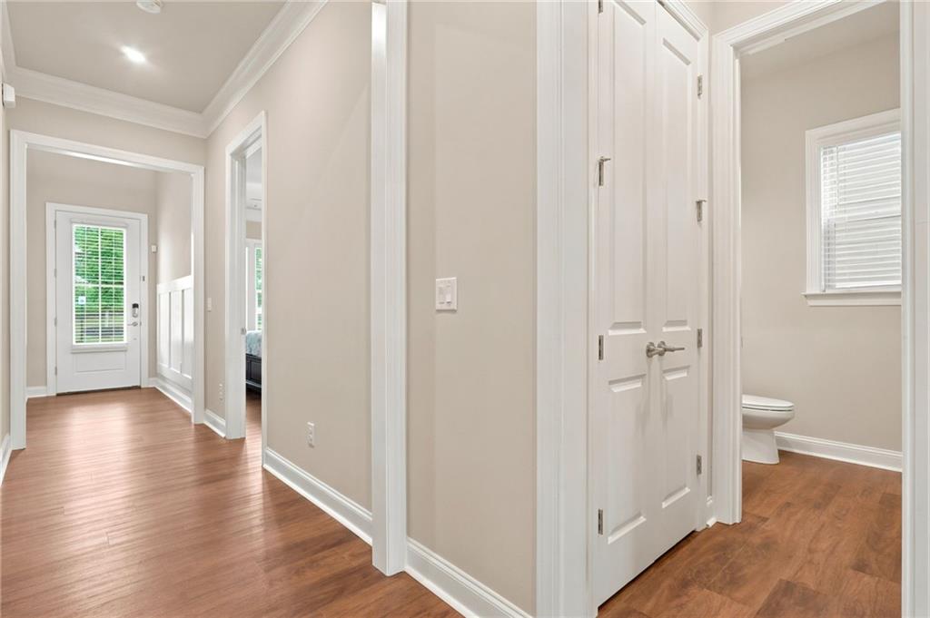 2070 Abbey Road Roswell, GA 30076 - Photo 44 of 65 a view of a bathroom with toilet windows and hallway