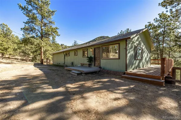 a kitchen with stainless steel appliances a stove sink and microwave