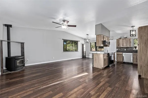 a bathroom with a sink toilet and mirror
