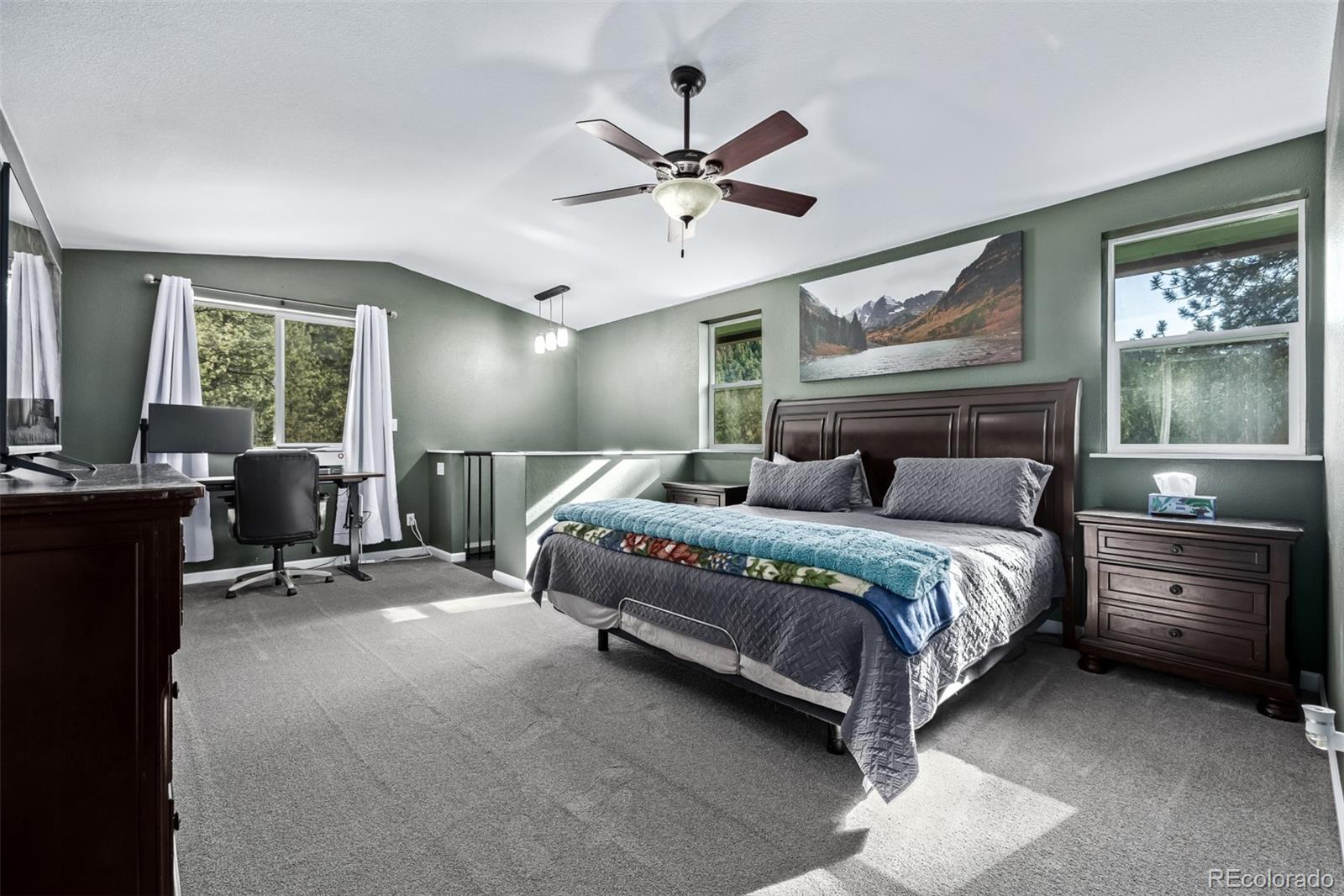 20 Parkview Bailey, CO 80421 - Photo 26 of 50 a bedroom with a large bed and window