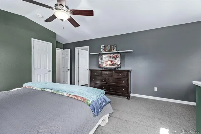 a bathroom with double sink and a mirror