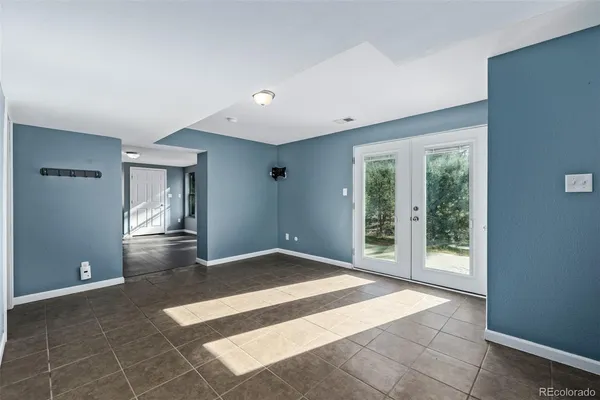 a view of balcony with wooden floor