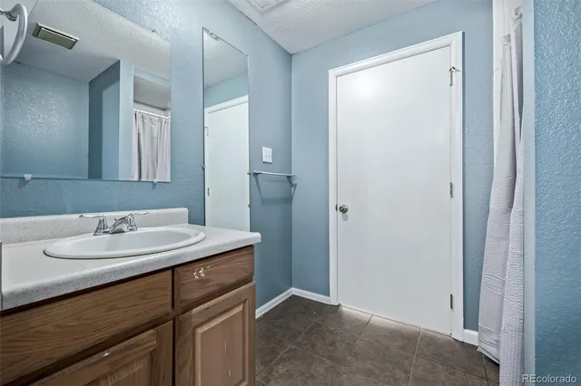 a view of balcony with wooden floor