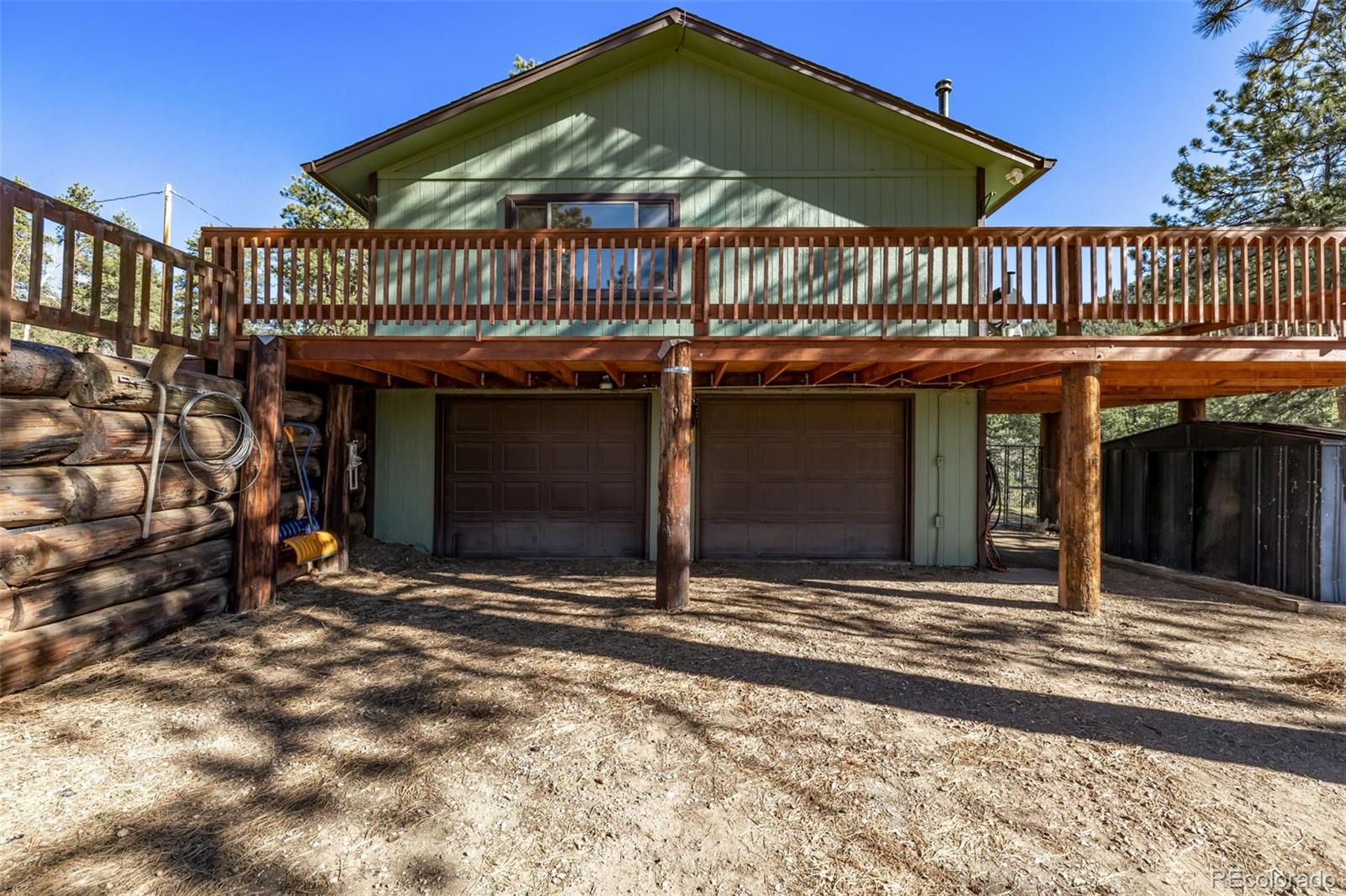 20 Parkview Bailey, CO 80421 - Photo 4 of 50 a view of a house with a porch and furniture