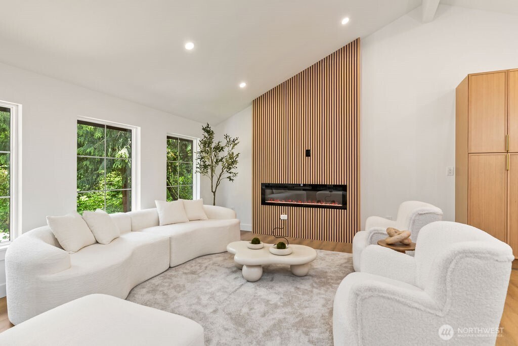 19433 Southeast 128th Street Renton, WA 98059 - Photo 12 of 40 a living room with furniture and a large window
