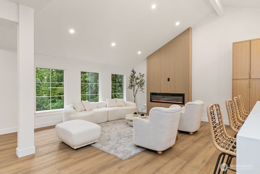19433 Southeast 128th Street Renton, WA 98059 - Photo 14 of 40 a living room with furniture and a large window