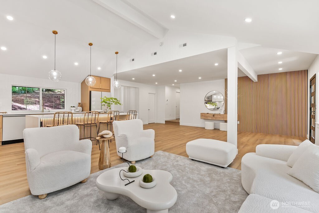 19433 Southeast 128th Street Renton, WA 98059 - Photo 16 of 40 a living room with furniture and a wooden floor
