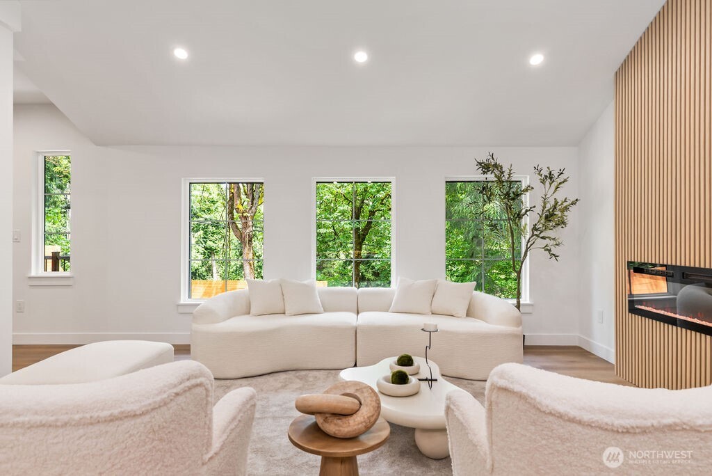 19433 Southeast 128th Street Renton, WA 98059 - Photo 17 of 40 a living room with furniture and a large window