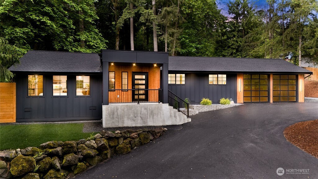 19433 Southeast 128th Street Renton, WA 98059 - Photo 2 of 40 a view of a house with a garden and pathway