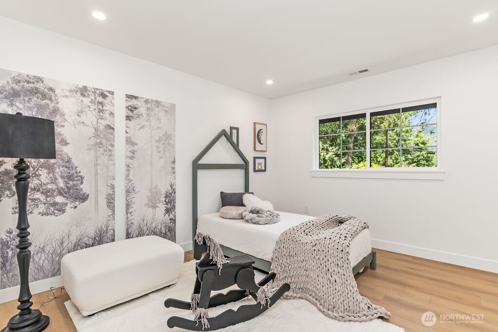 19433 Southeast 128th Street Renton, WA 98059 - Photo 29 of 40 a view of a workspace with furniture and a window