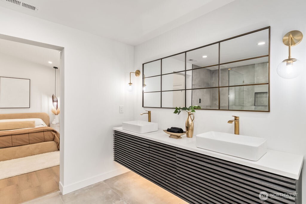 19433 Southeast 128th Street Renton, WA 98059 - Photo 33 of 40 a bathroom with a sink and a mirror