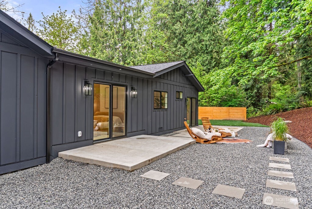19433 Southeast 128th Street Renton, WA 98059 - Photo 38 of 40 a view of a backyard with a large tree