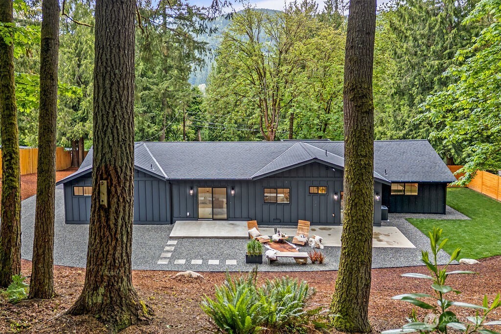 19433 Southeast 128th Street Renton, WA 98059 - Photo 5 of 40 a front view of a house with garden
