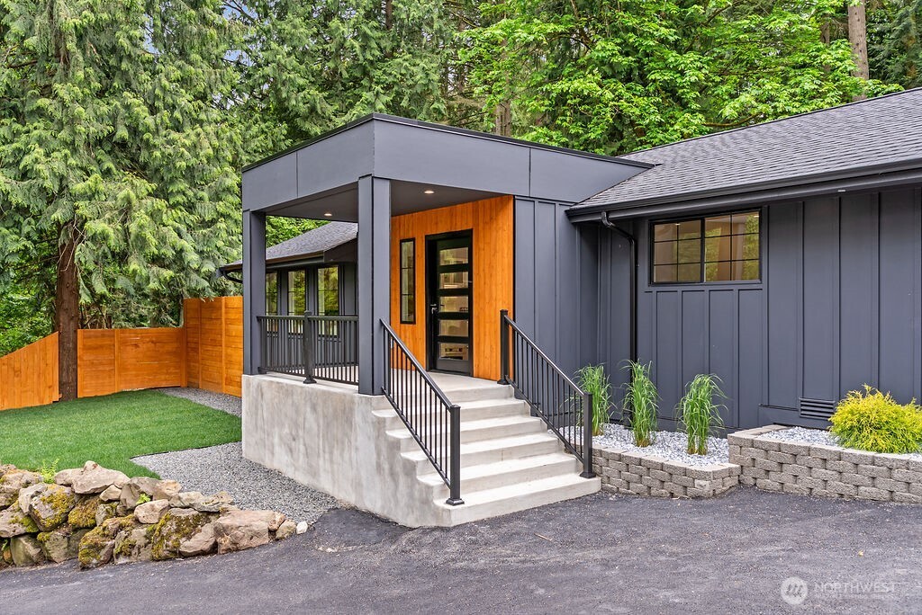 19433 Southeast 128th Street Renton, WA 98059 - Photo 8 of 40 a front view of a house with garden