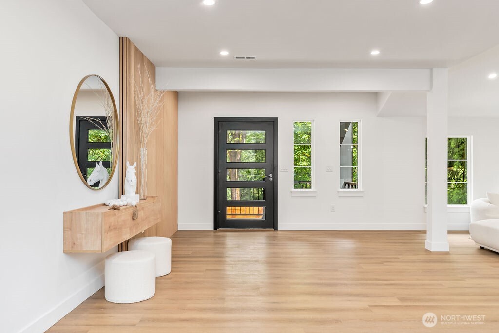 19433 Southeast 128th Street Renton, WA 98059 - Photo 9 of 40 a view of a living room and window
