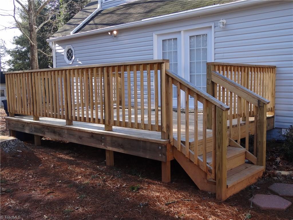 524 High Point Street Randleman, NC 27317 - Photo 28 of 30 NEW 16 X 12 deck off the formal dining room