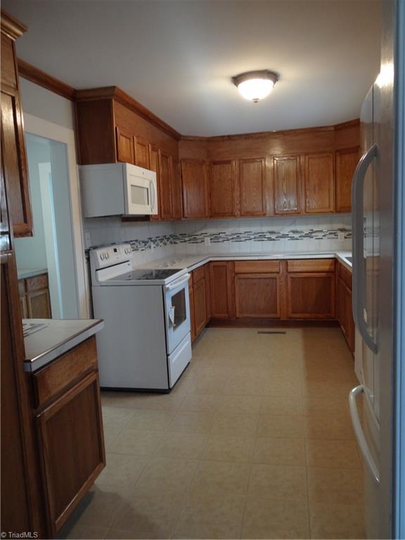 524 High Point Street Randleman, NC 27317 - Photo 4 of 30 Plenty of cabinet & counter space