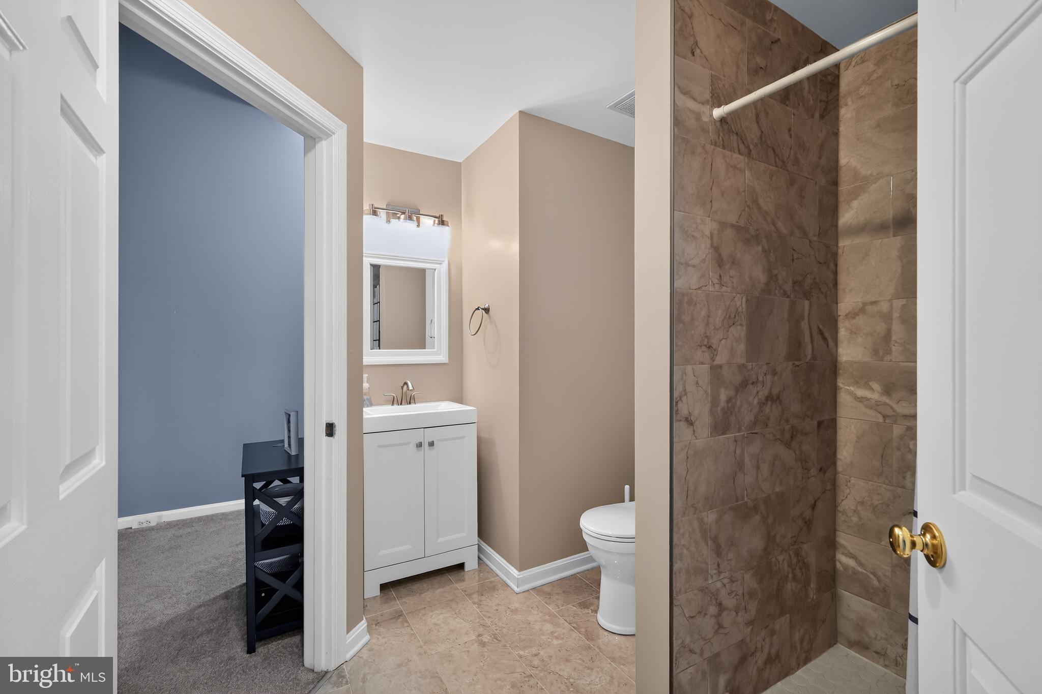 10100 Ridge Manor Terrace, Unit 5000L Damascus, MD 20872 - Photo 12 of 15 Modern bathroom #2 with elegant finishes.