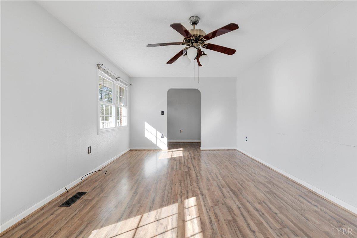 813 Doss Road Concord, VA 24538 - Photo 30 of 31 a view of a room with wooden floor and window