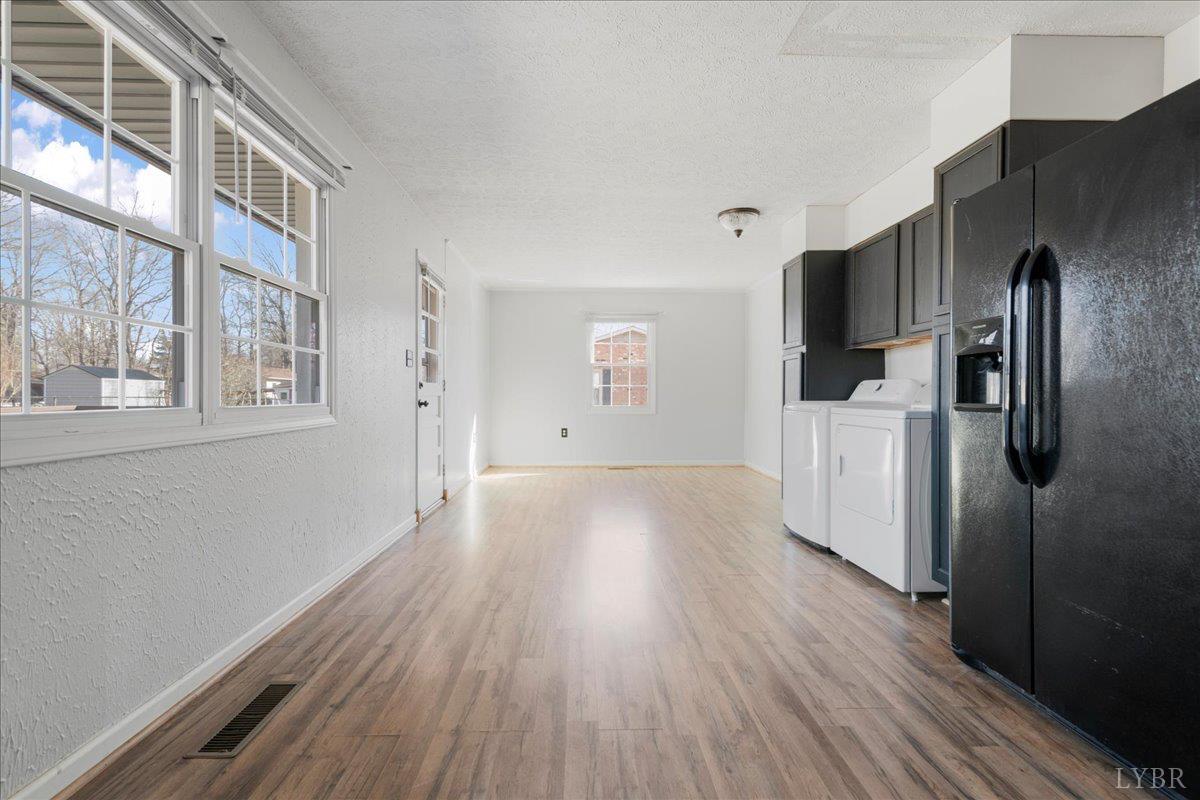 813 Doss Road Concord, VA 24538 - Photo 4 of 31 a view of empty room with wooden floor