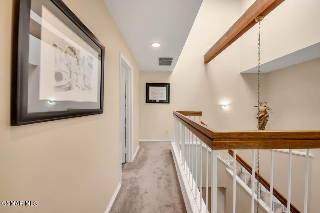1736 Sinaloa Road, Unit 324 Simi Valley, CA 93065 - Photo 11 of 37 a view of hallway with stairs