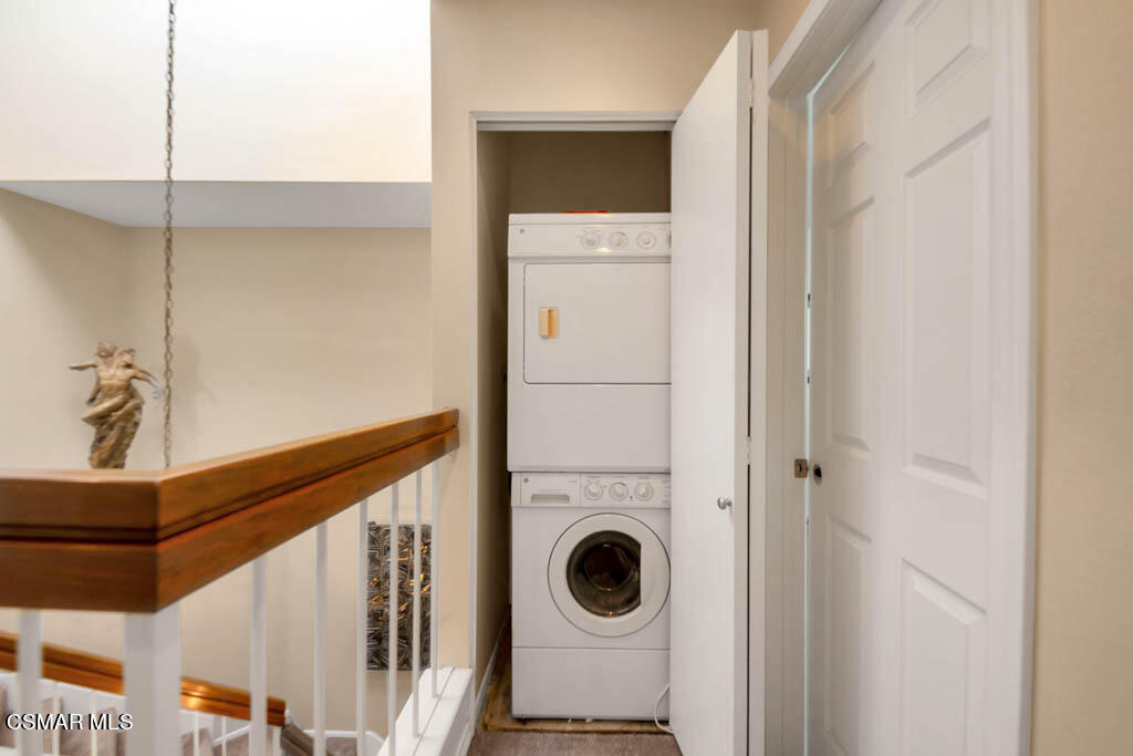 1736 Sinaloa Road, Unit 324 Simi Valley, CA 93065 - Photo 12 of 37 a view of a hallway with washer and dryer