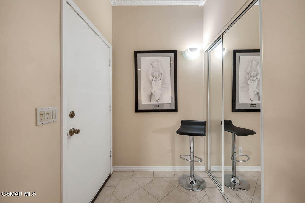 1736 Sinaloa Road, Unit 324 Simi Valley, CA 93065 - Photo 17 of 37 a view of a livingroom with wooden floor and bathroom
