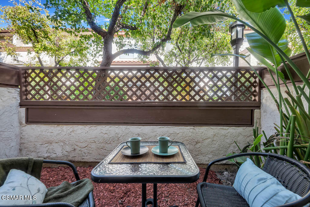 1736 Sinaloa Road, Unit 324 Simi Valley, CA 93065 - Photo 20 of 37 a backyard of a house with seating space