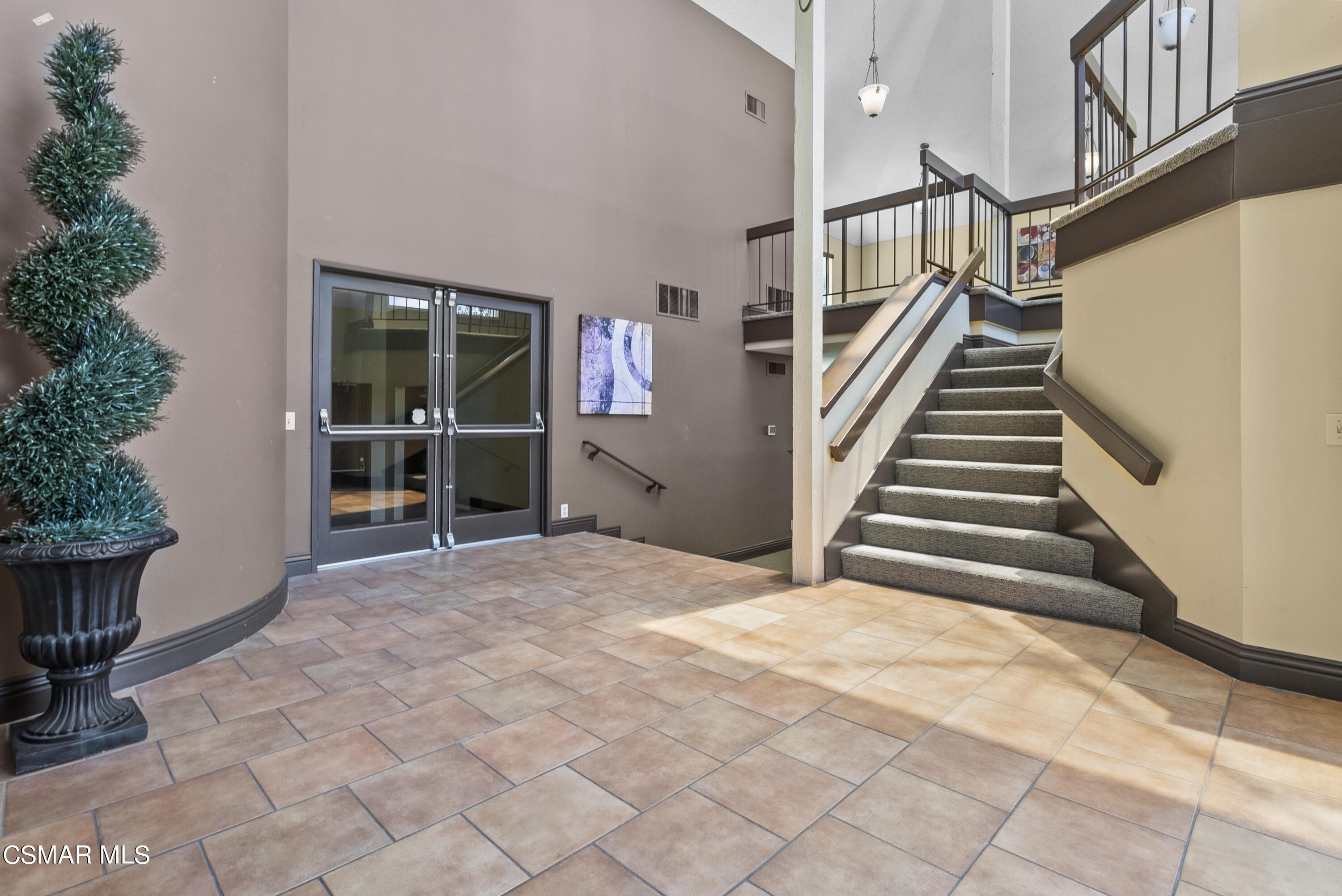 1736 Sinaloa Road, Unit 324 Simi Valley, CA 93065 - Photo 26 of 37 a view of a house with entryway and stairs