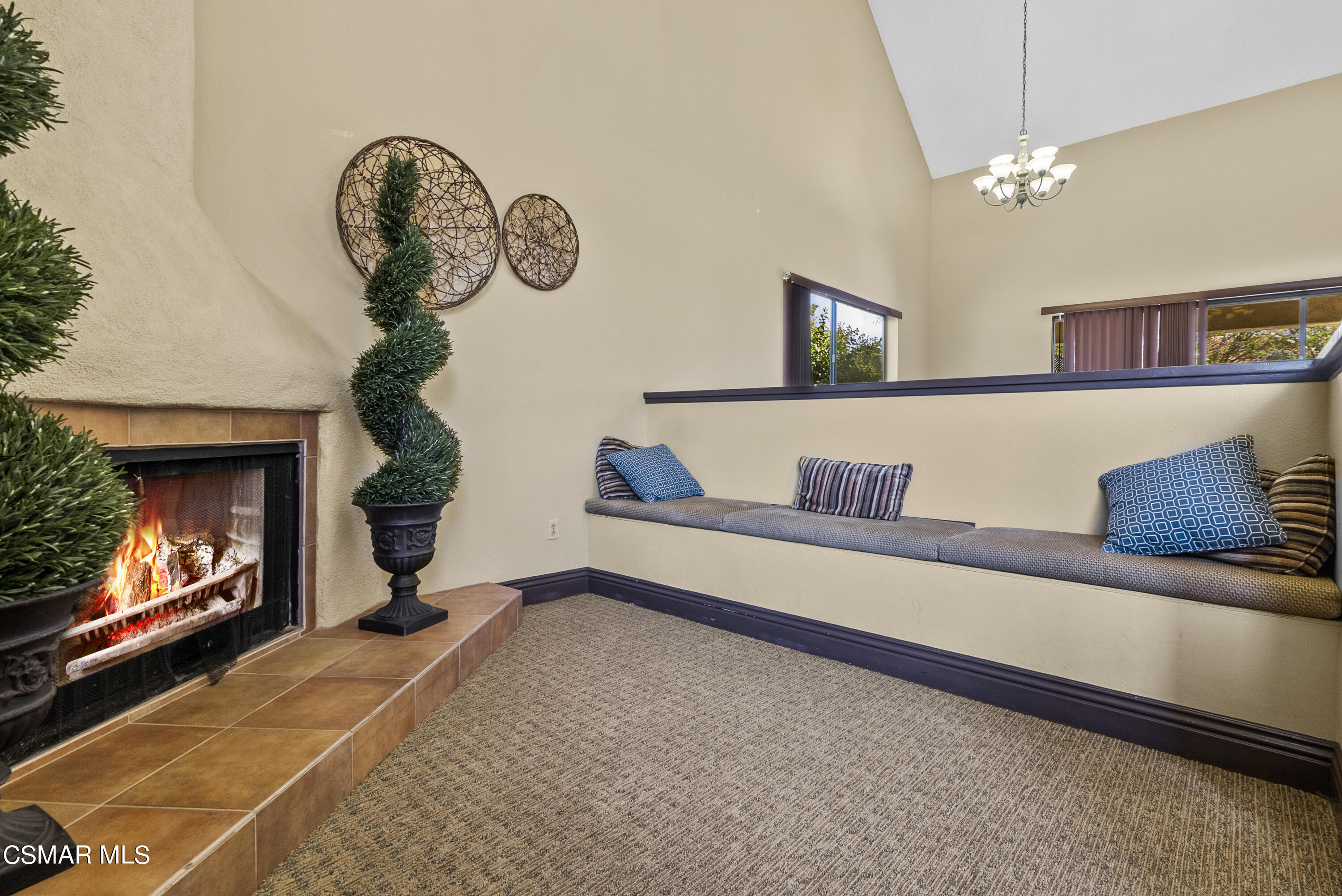 1736 Sinaloa Road, Unit 324 Simi Valley, CA 93065 - Photo 27 of 37 a living room with furniture and a fireplace