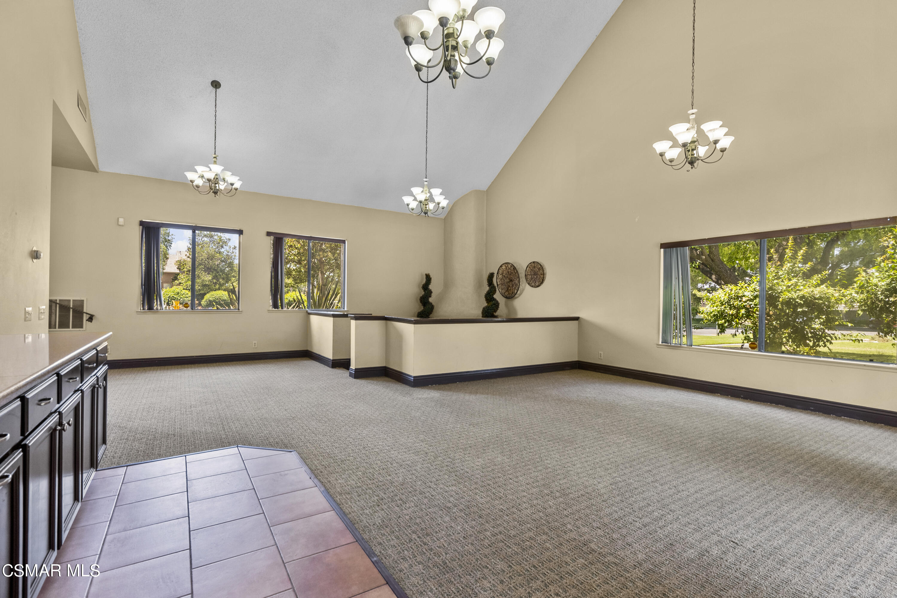 1736 Sinaloa Road, Unit 324 Simi Valley, CA 93065 - Photo 32 of 37 a view of a chandelier and window in a room